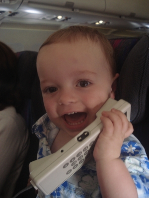 Nate talking on the phone while flying from San Franciso to Burbank in 2006
